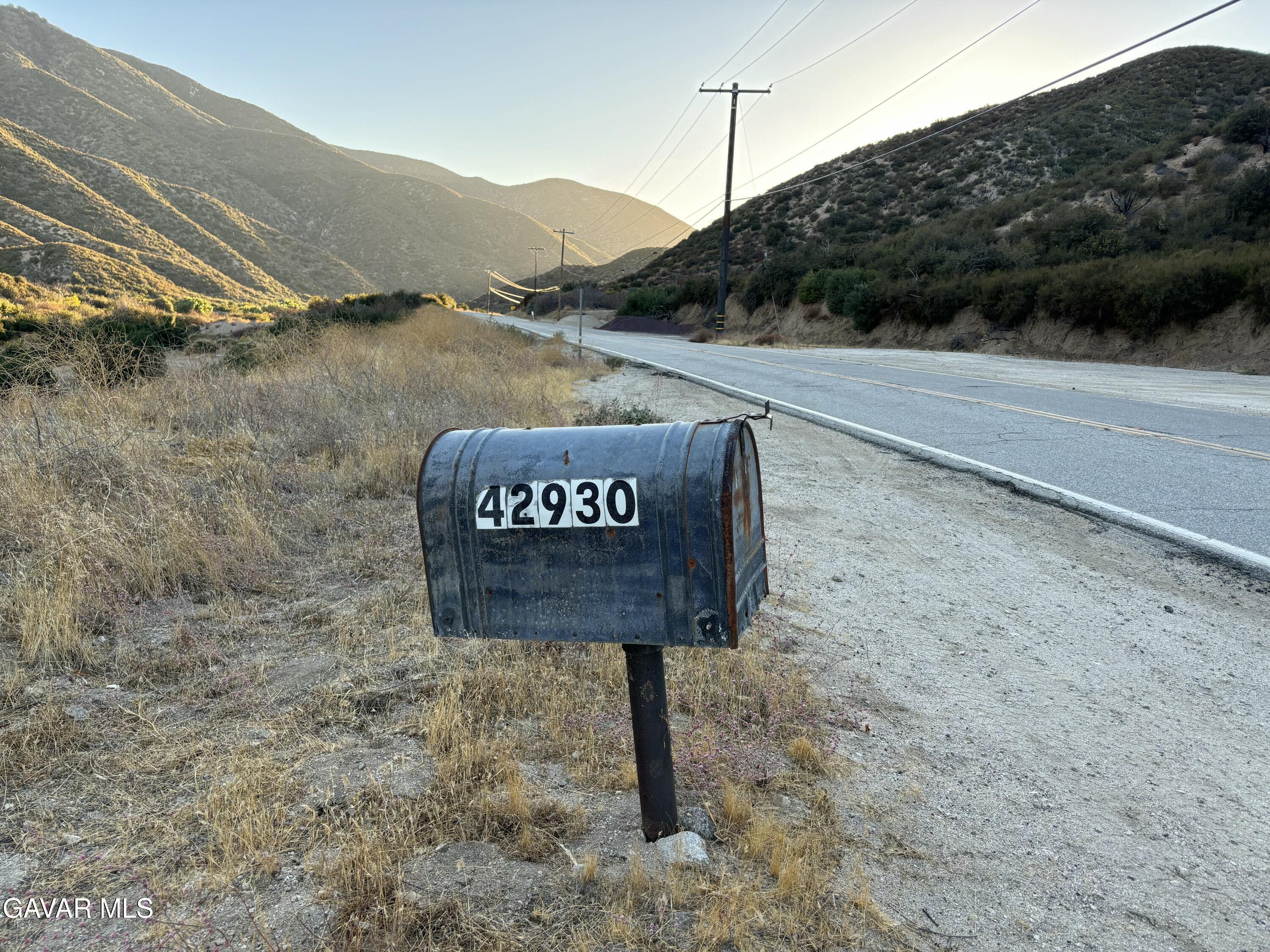42930 Lake Hughes Road Lake Hughes, CA 93532 - Photo 10 of 38 a view of a sign board with mountain