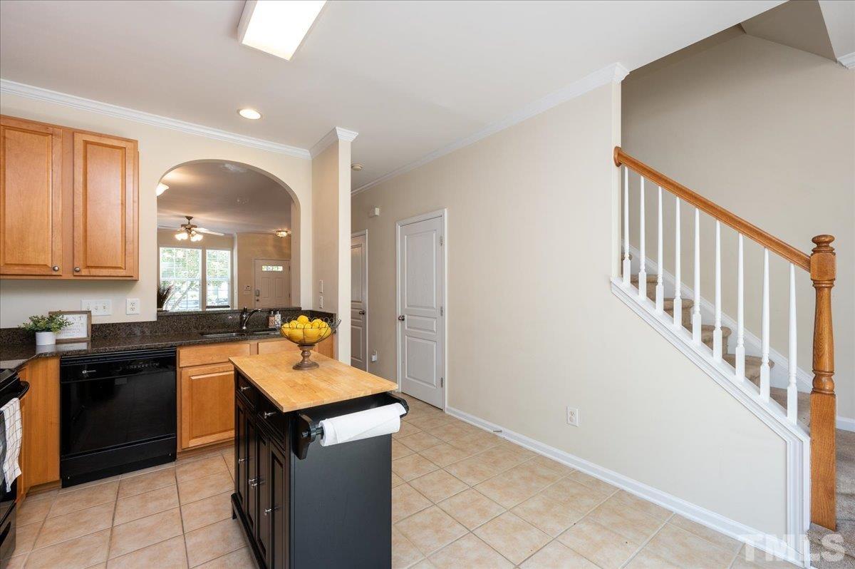 160 Grey Elm Trail Durham, NC 27713 - Photo 13 of 25 a kitchen with a sink and cabinets