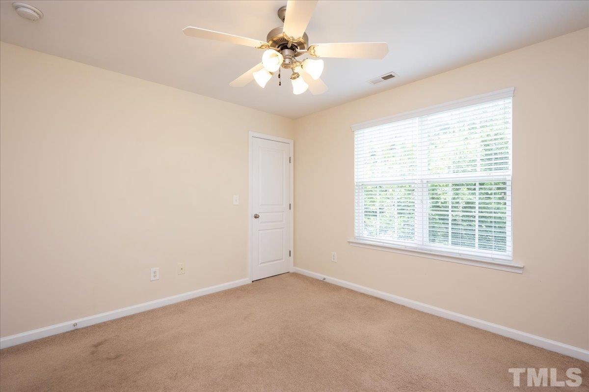 160 Grey Elm Trail Durham, NC 27713 - Photo 18 of 25 a view of an empty room with a window