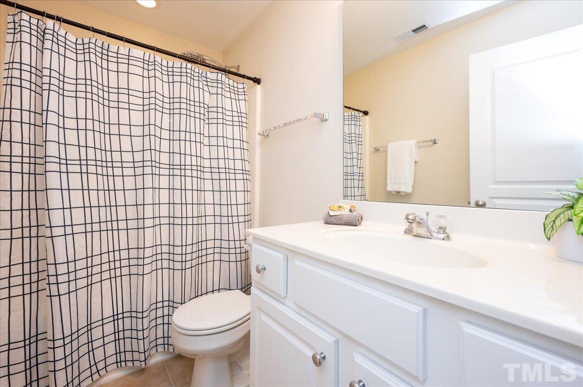 160 Grey Elm Trail Durham, NC 27713 - Photo 19 of 25 a bathroom with a sink toilet and shower