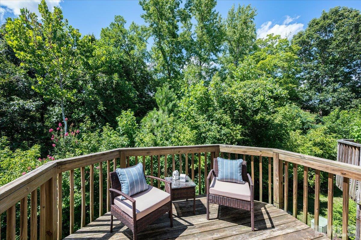 160 Grey Elm Trail Durham, NC 27713 - Photo 5 of 25 a view of a two chairs in the deck