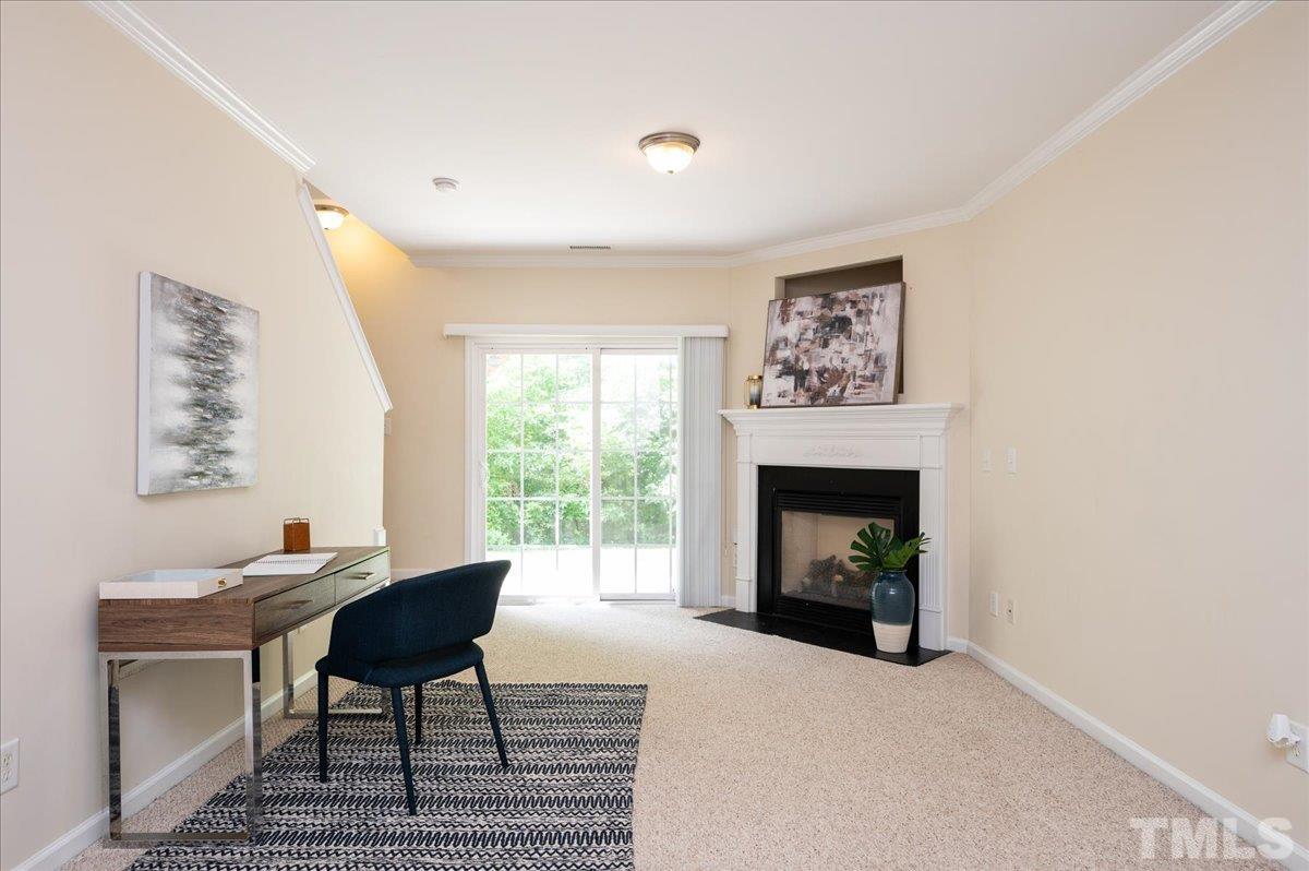 160 Grey Elm Trail Durham, NC 27713 - Photo 6 of 25 a living room with furniture and a fireplace