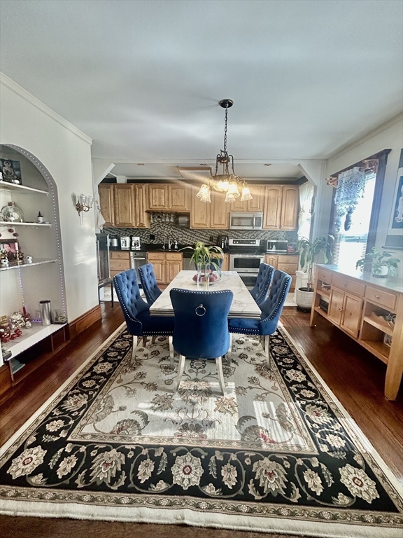 114 Lovell Street Worcester, MA 01603 - Photo 11 of 39 a living room with a couch and a table