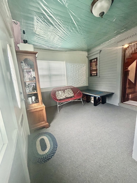 114 Lovell Street Worcester, MA 01603 - Photo 16 of 39 a bedroom with furniture and a window