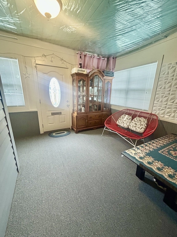 114 Lovell Street Worcester, MA 01603 - Photo 17 of 39 a bedroom with a bed and a dresser