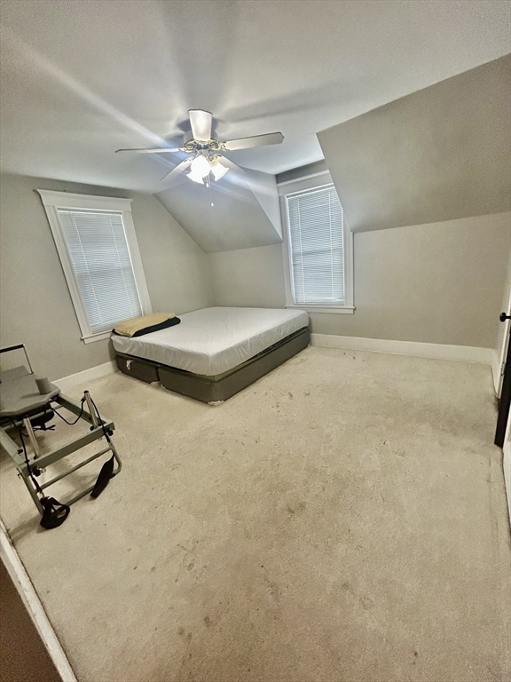 114 Lovell Street Worcester, MA 01603 - Photo 21 of 39 a room with a chandelier