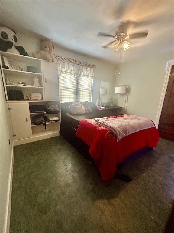 114 Lovell Street Worcester, MA 01603 - Photo 25 of 39 a bedroom with a bed and a night stand