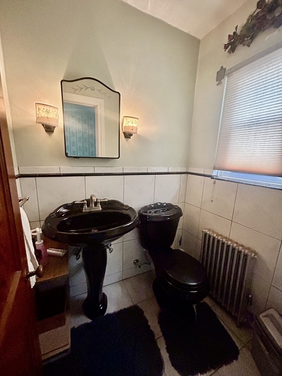 114 Lovell Street Worcester, MA 01603 - Photo 28 of 39 a view of sitting area with furniture and wooden floor