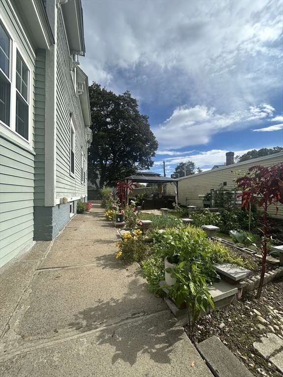 114 Lovell Street Worcester, MA 01603 - Photo 5 of 39 a view of a street with houses