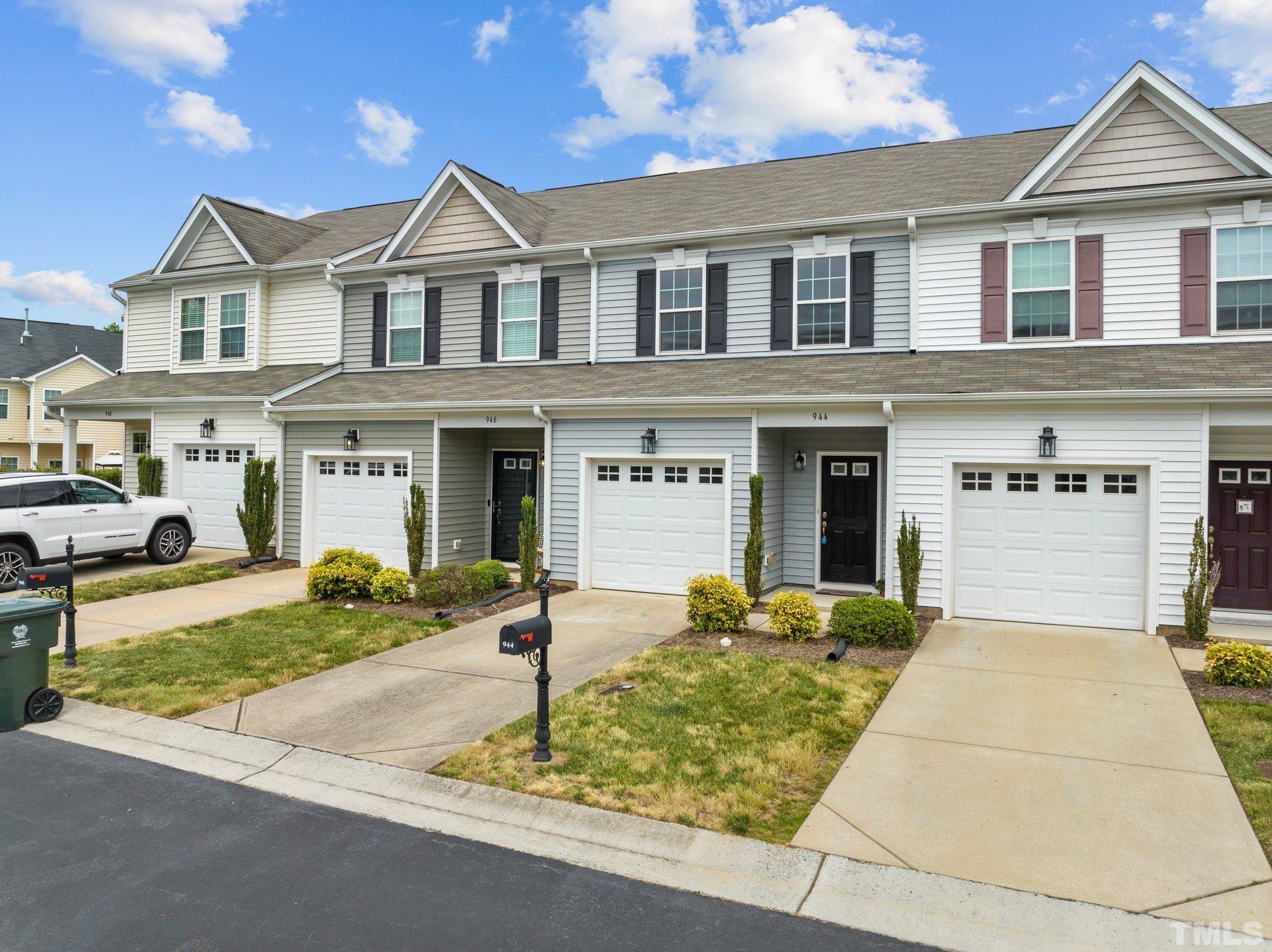 944 Consortium Drive Raleigh, NC 27603 - Photo 2 of 30 front view of a house with a yard