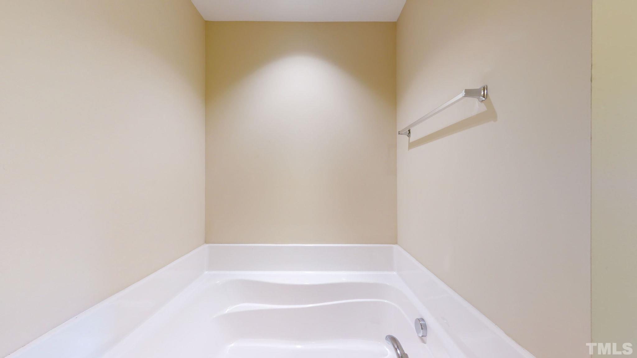 944 Consortium Drive Raleigh, NC 27603 - Photo 23 of 30 a bathroom with a bathtub