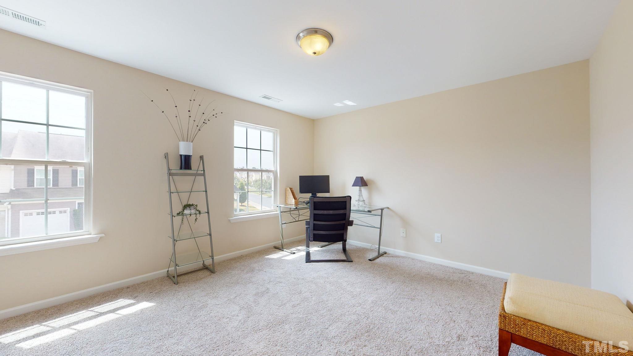 944 Consortium Drive Raleigh, NC 27603 - Photo 24 of 30 a view of a livingroom with furniture