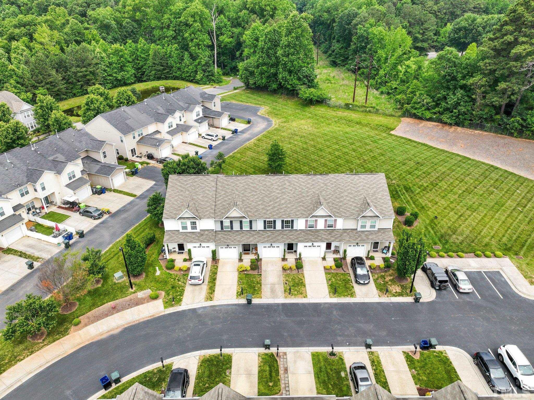 944 Consortium Drive Raleigh, NC 27603 - Photo 6 of 30 an aerial view of a house with a garden