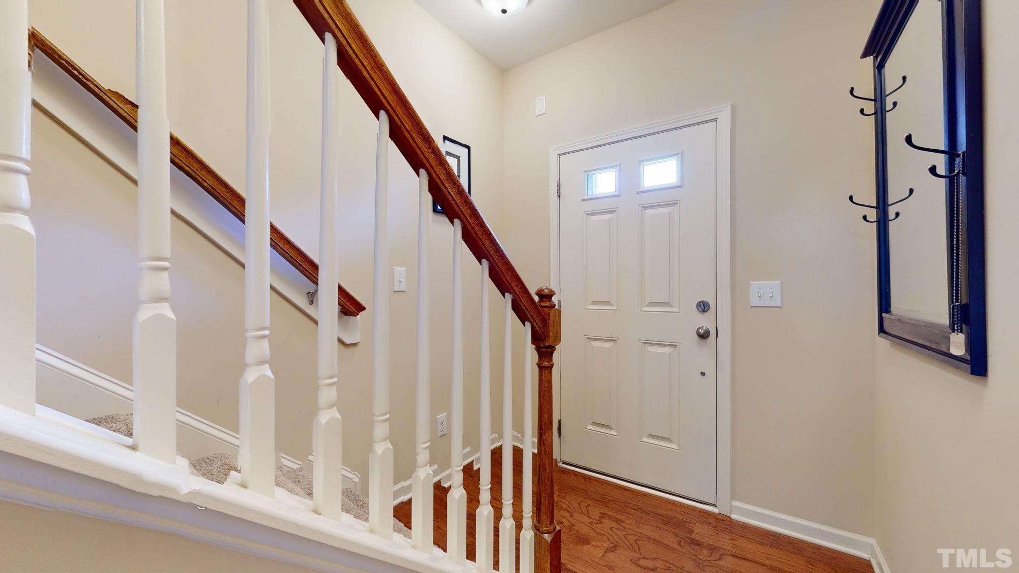 944 Consortium Drive Raleigh, NC 27603 - Photo 9 of 30 a view of an entryway with staircase