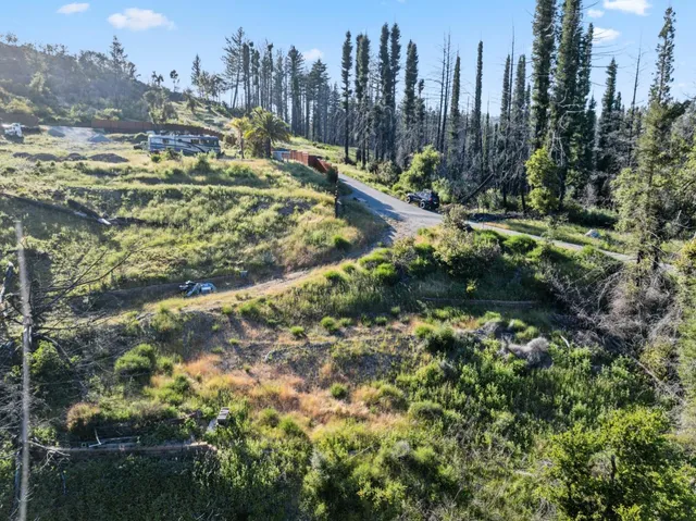 a view of a houses with a yard