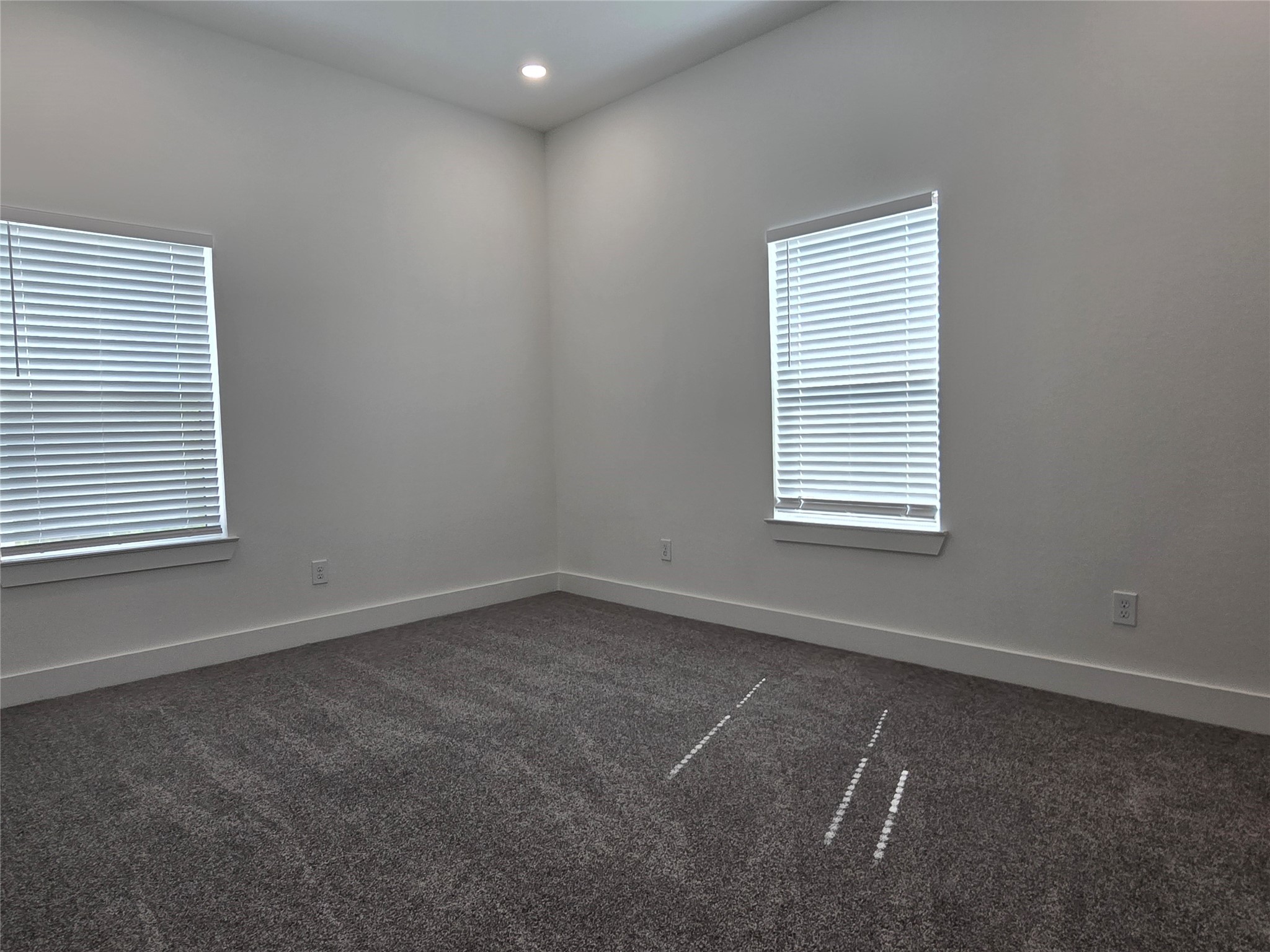 9808 Pelsey Street, Unit B Houston, TX 77029 - Photo 12 of 17 an empty room with a window