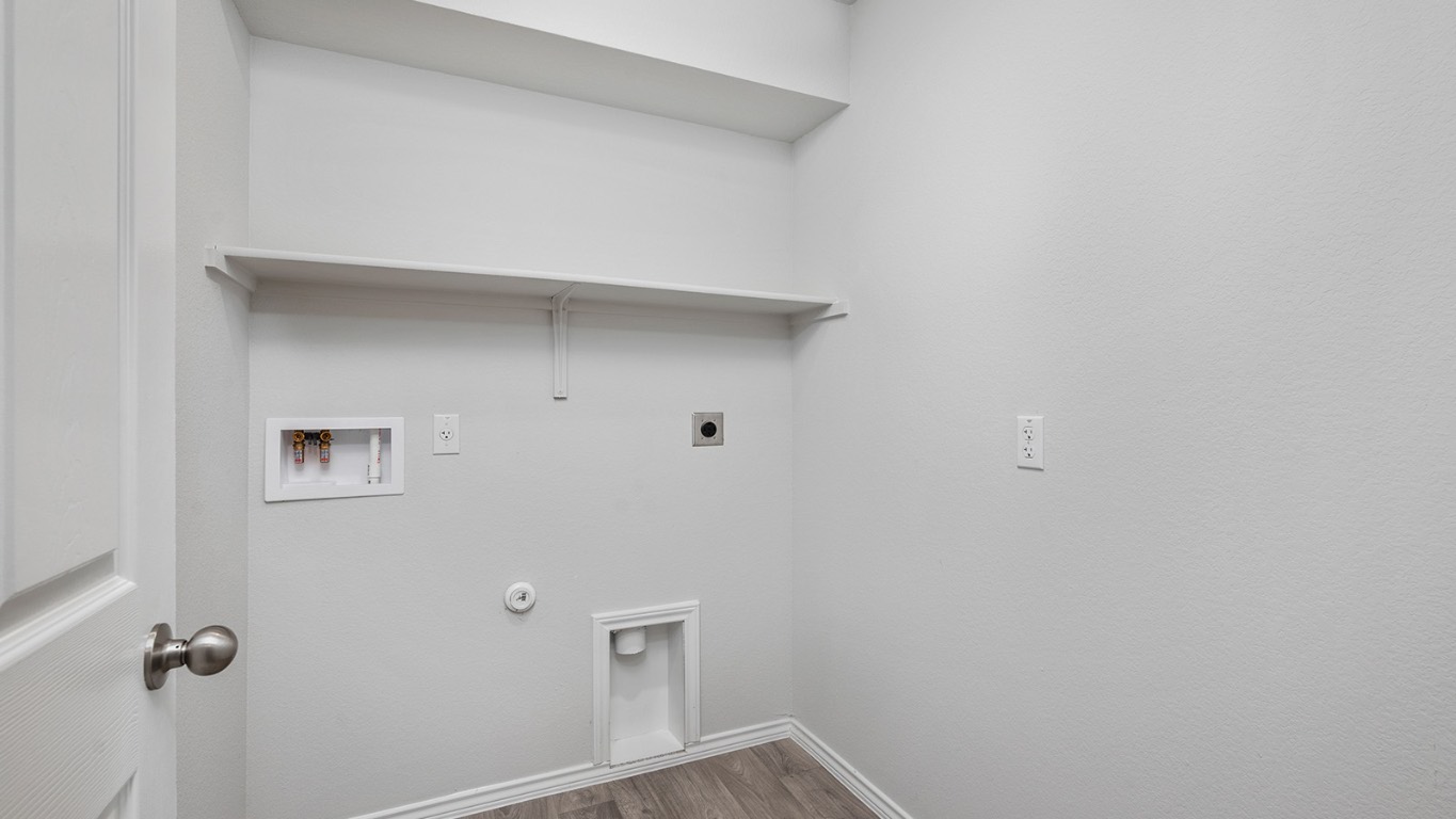 1423 Coriander Road Temple, TX 76501 - Photo 20 of 22 Laundry room with hookup for a gas dryer, dark wood-type flooring, washer hookup, and hookup for an electric dryer