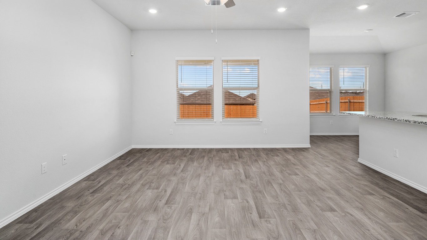 1423 Coriander Road Temple, TX 76501 - Photo 8 of 22 Spare room featuring light wood-style flooring, a ceiling fan, and recessed lighting