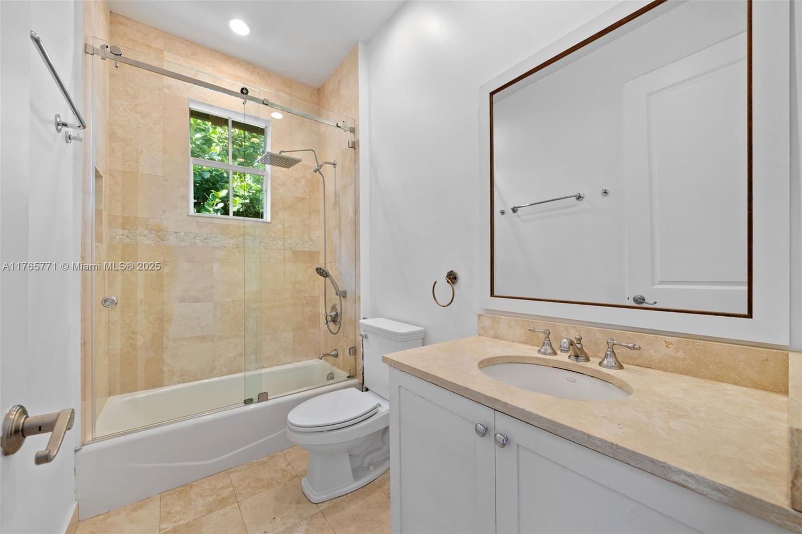 464 Fernwood Road, Unit B Key Biscayne, FL 33149 - Photo 28 of 48 a bathroom with a granite countertop sink toilet and shower