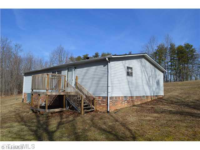 3629 Pine Ridge Road Lowgap, NC 27024 - Photo 3 of 16 Exterior Back.