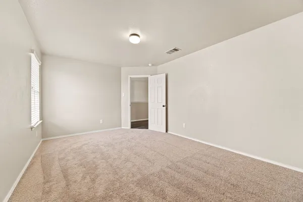 an empty room with a workbench