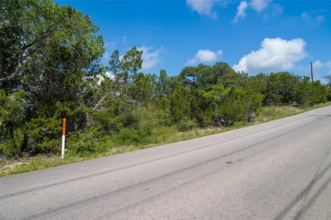 a view of a pathway both side of yard
