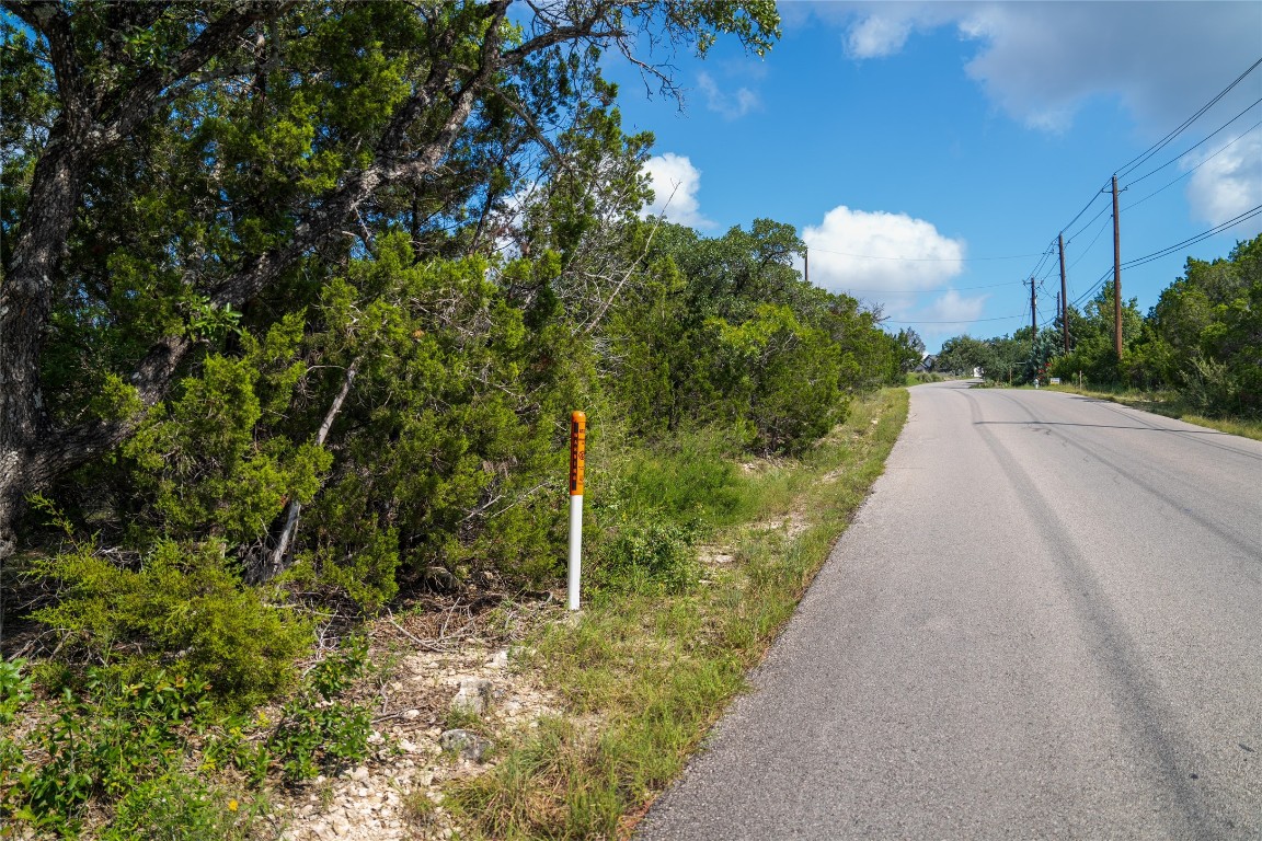 0 Geronimo Trail Austin, TX 78734 - Photo 6 of 8 a view of a pathway both side of yard