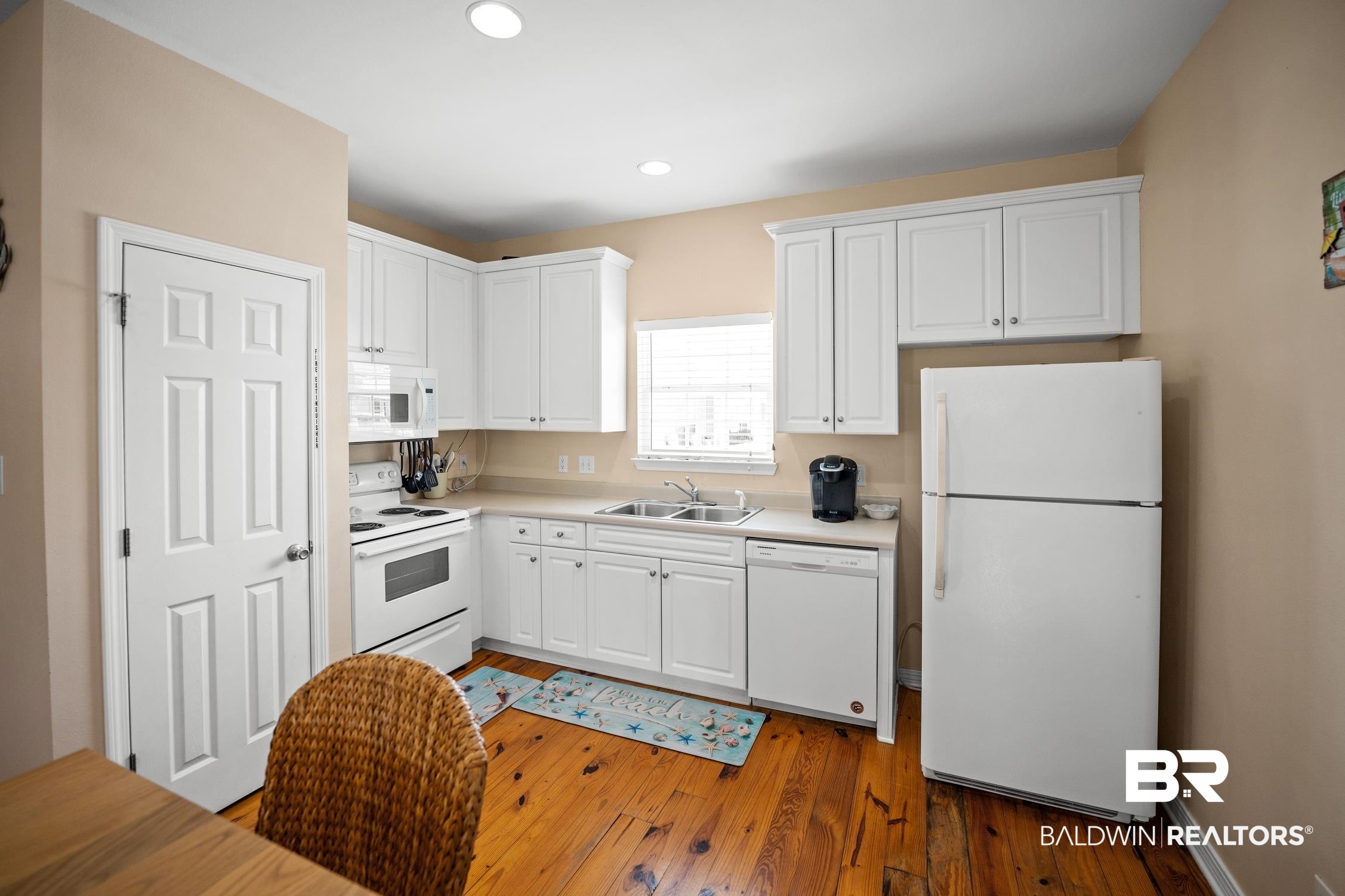 208 Windmill Ridge Road, Unit B Gulf Shores, AL 36542 - Photo 9 of 37 Kitchen with Lagoon View from Window