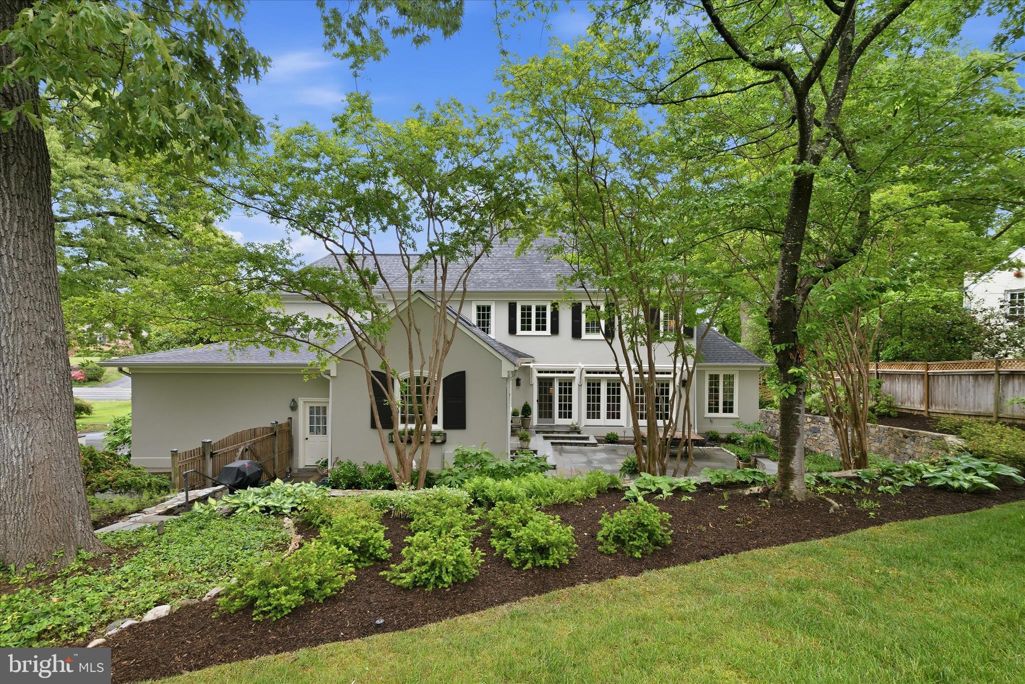 3824 Military Road Arlington, VA 22207 - Photo 2 of 54 a front view of a house with a yard