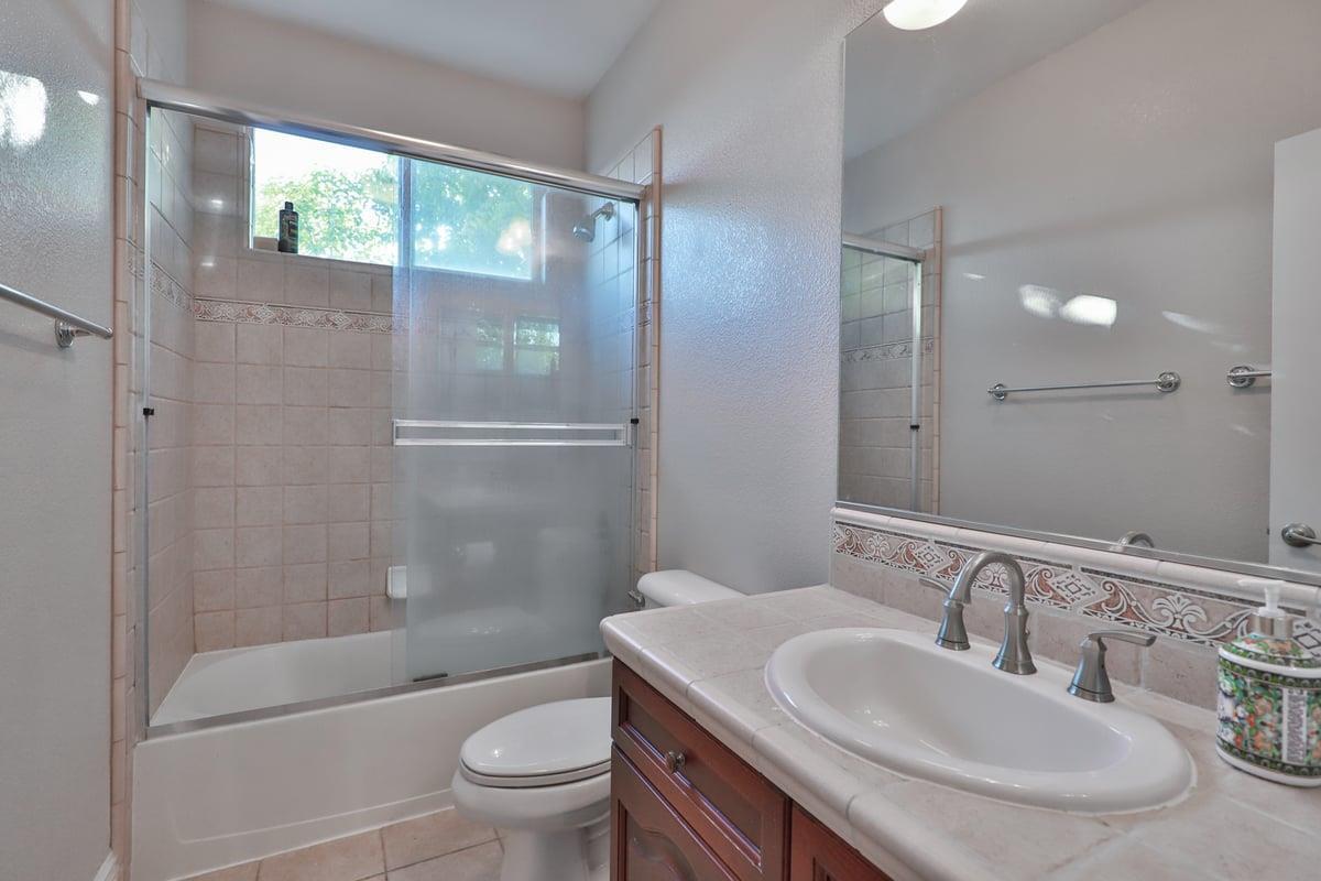5100 Thalia Drive El Dorado Hills, CA 95762 - Photo 53 of 60 a bathroom with a sink toilet and shower