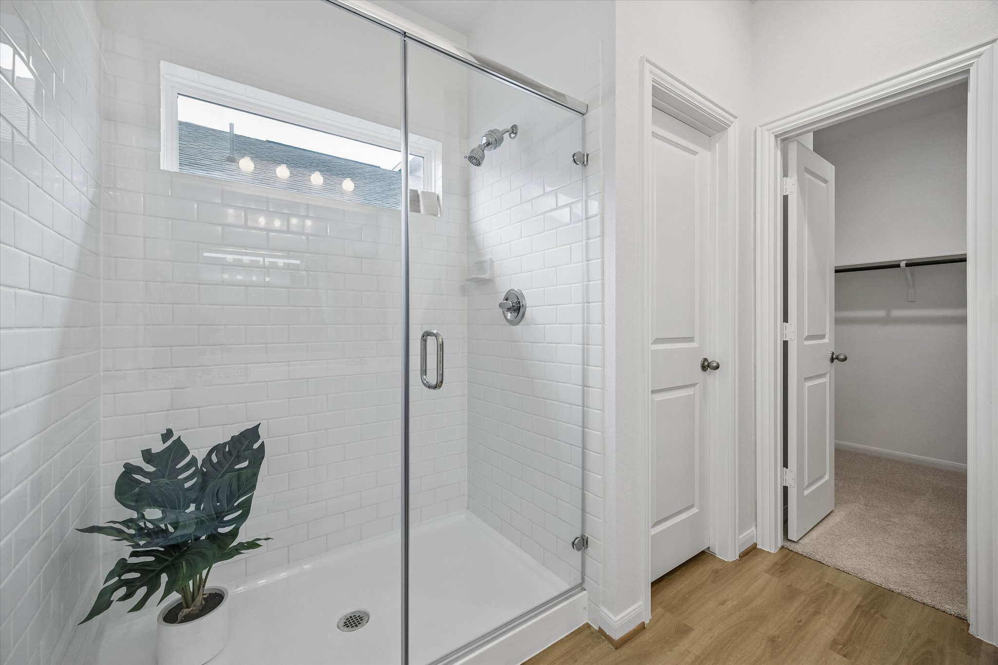 157 LT Rusty Drive Jarrell, TX 76537 - Photo 15 of 39 a bathroom with a glass shower door