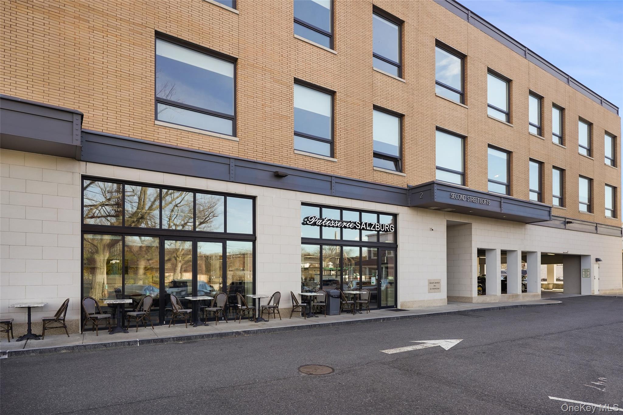 2 2nd Street, Unit 26 Rye, NY 10580 - Photo 5 of 8 a row of building with glass windows