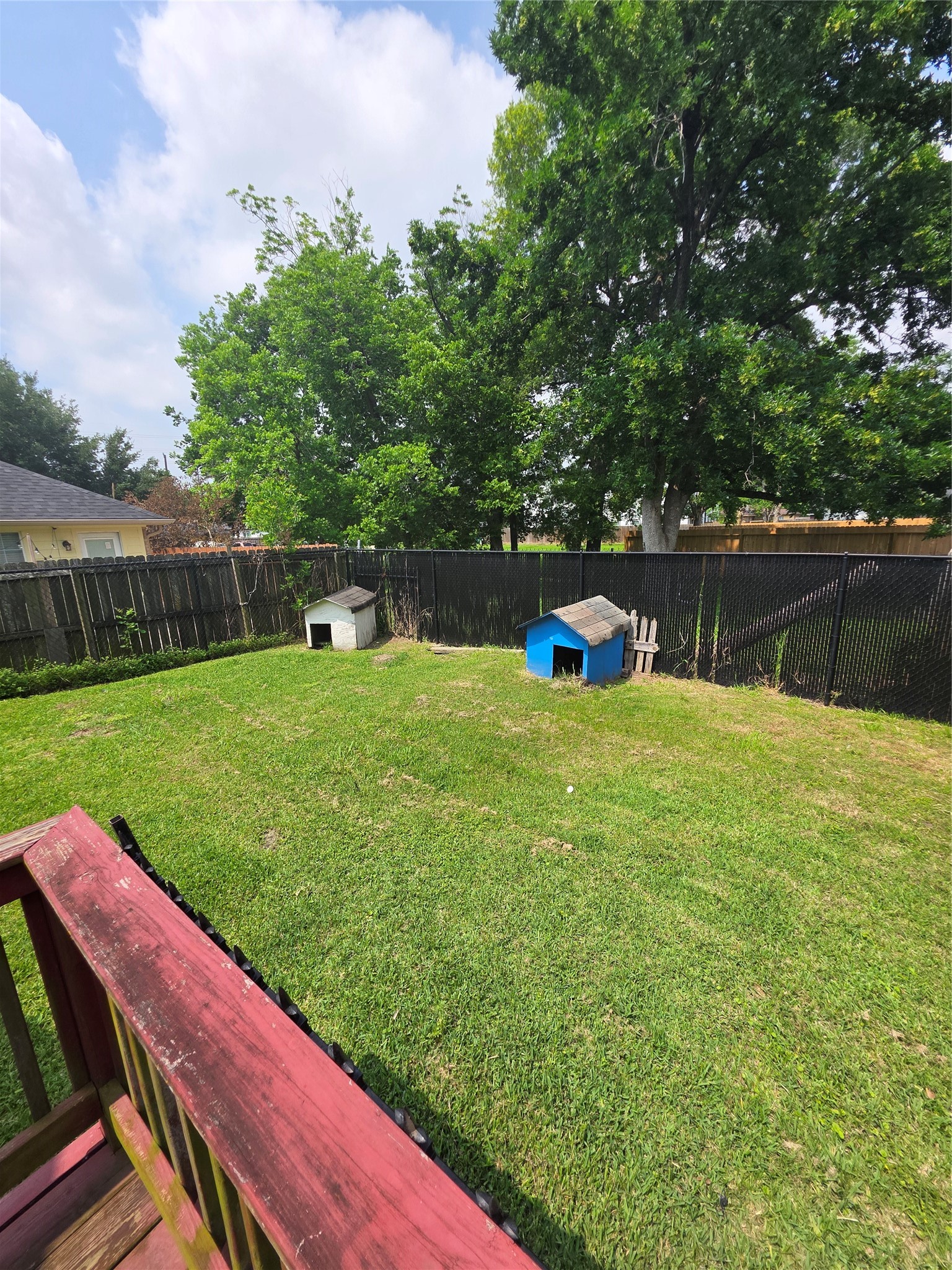 7106 Tierwester Street Houston, TX 77021 - Photo 9 of 11 a view of a backyard with a bench