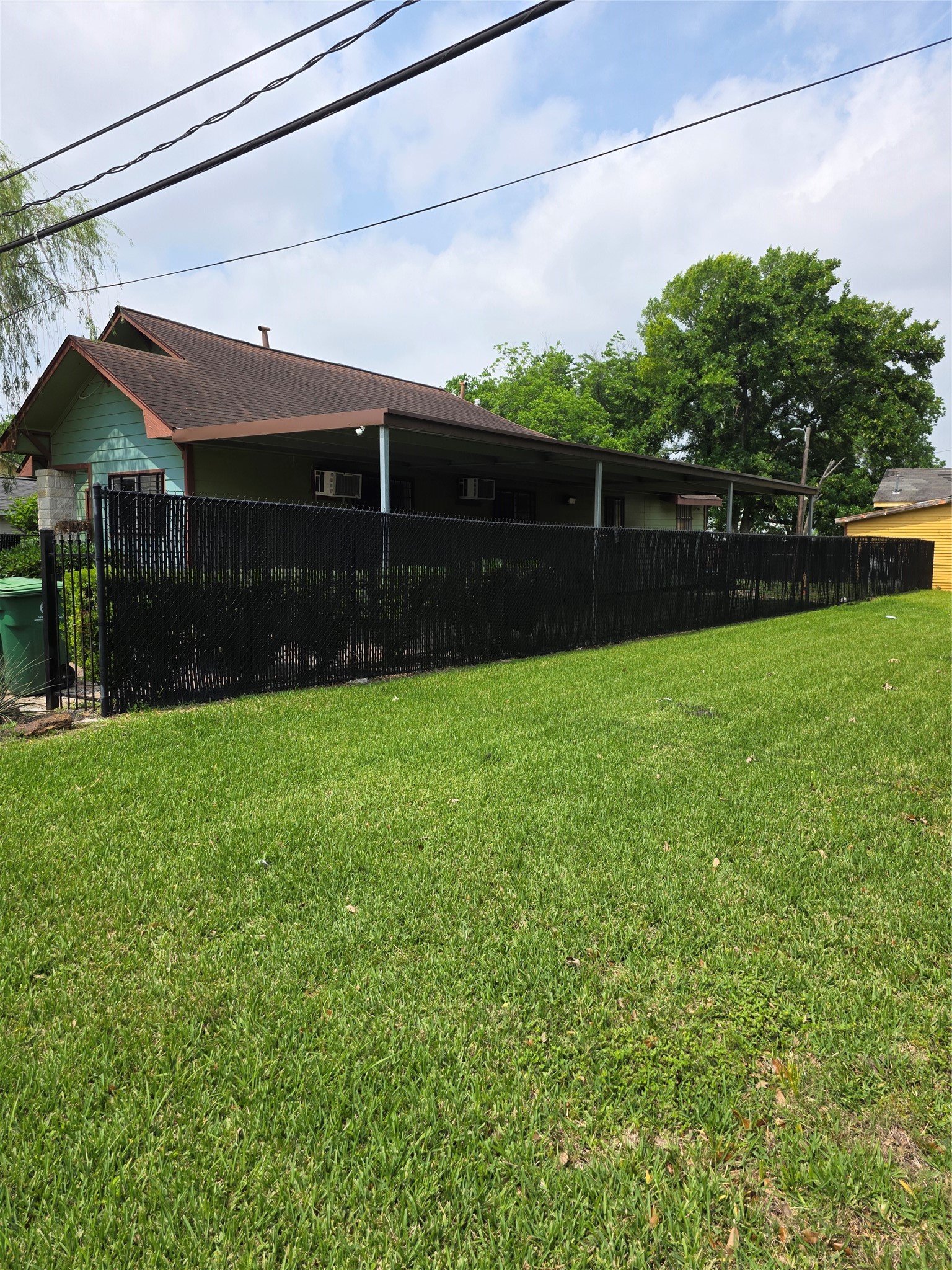 7106 Tierwester Street Houston, TX 77021 - Photo 10 of 11 a front view of house with yard and green space