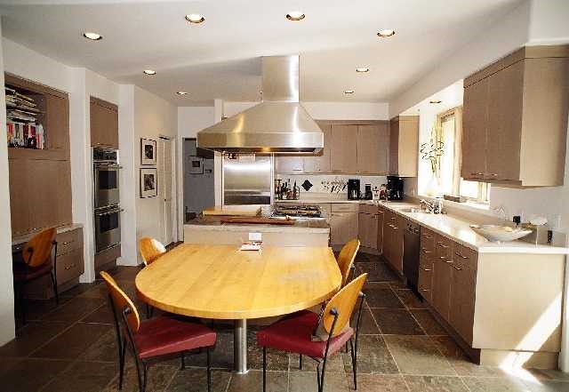 15 Sawbuck Road Reno, NV 89519 - Photo 3 of 5 a kitchen with stainless steel appliances a dining table and chairs