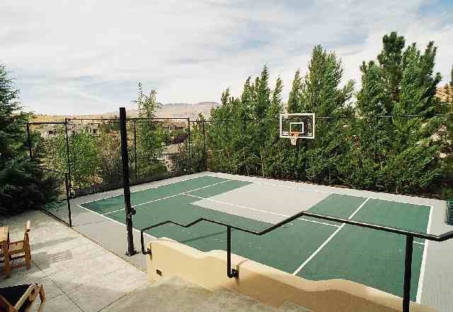15 Sawbuck Road Reno, NV 89519 - Photo 5 of 5 a view of a tennis ground with large trees