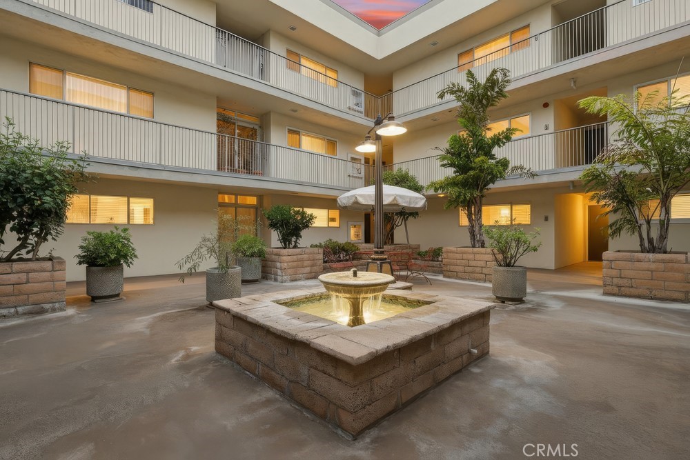 1187 East 3rd Street, Unit 210 Long Beach, CA 90802 - Photo 10 of 10 Courtyard in the evening