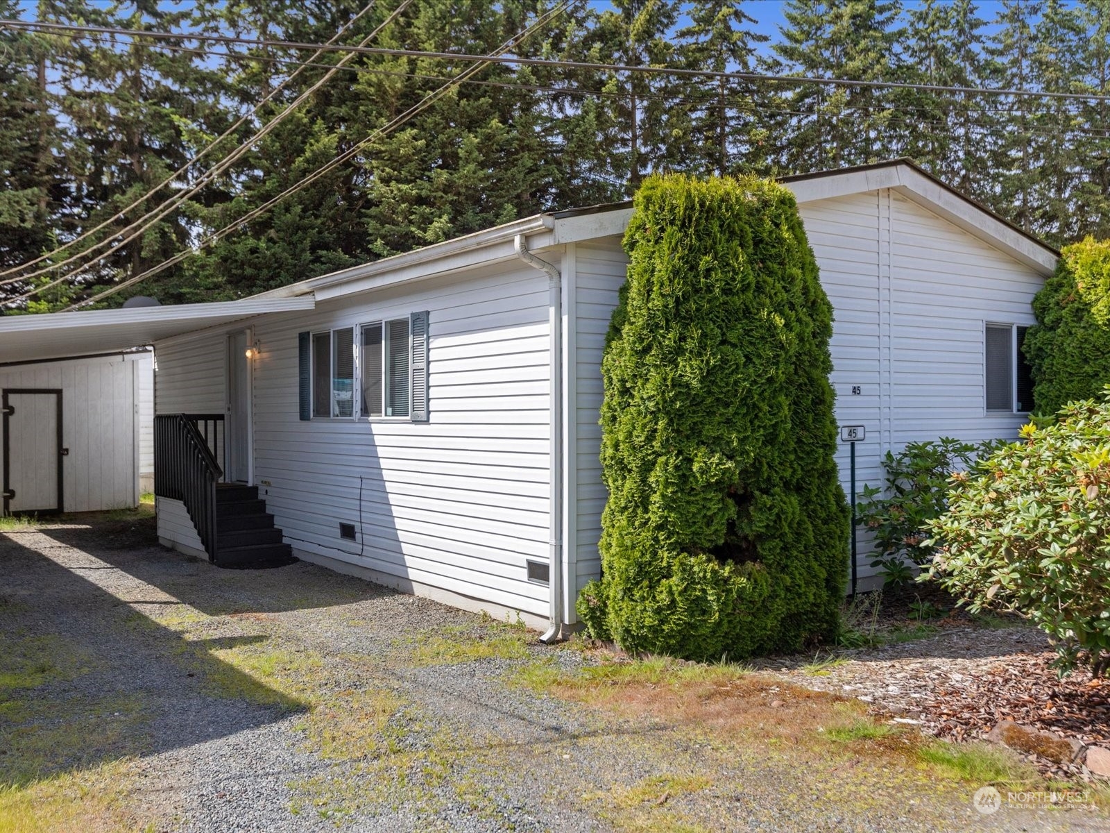 17432 Smokey Point Boulevard, Unit 45 Arlington, WA 98223 - Photo 1 of 24 a front view of a house with a yard