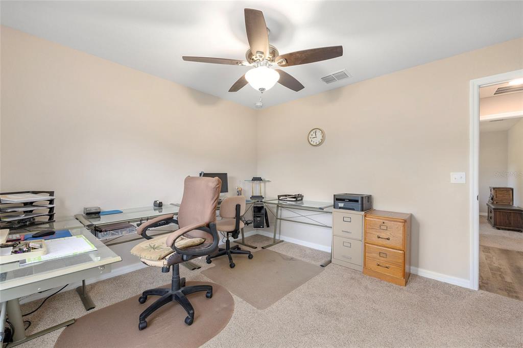 13057 Southwest 85th Circle Ocala, FL 34473 - Photo 16 of 34 a view of a workspace with furniture