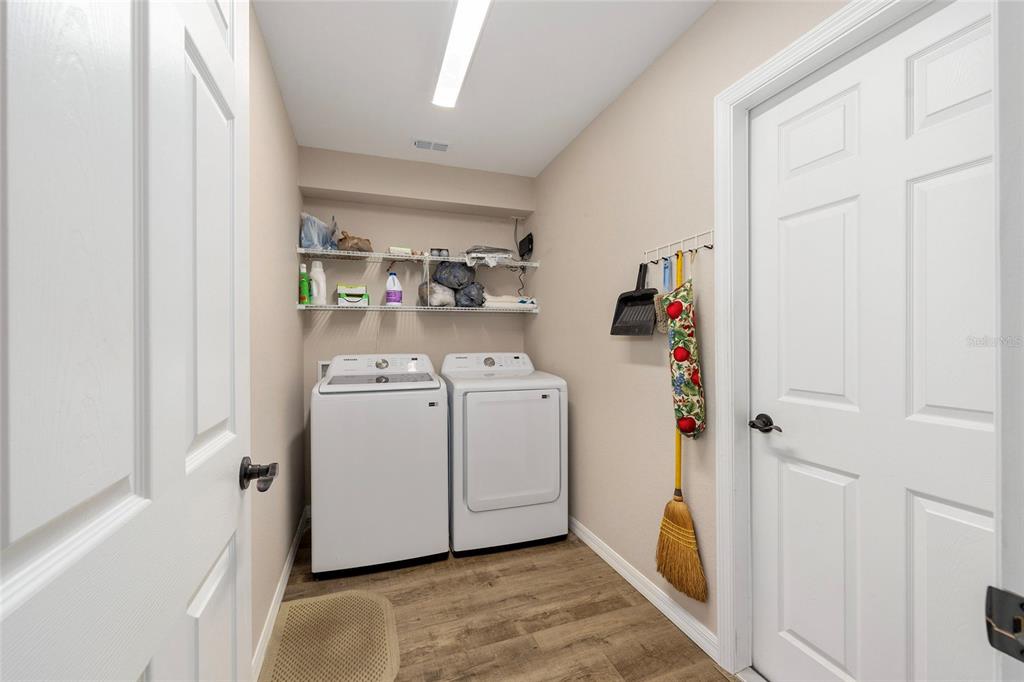 13057 Southwest 85th Circle Ocala, FL 34473 - Photo 19 of 34 a utility room with dryer and washer