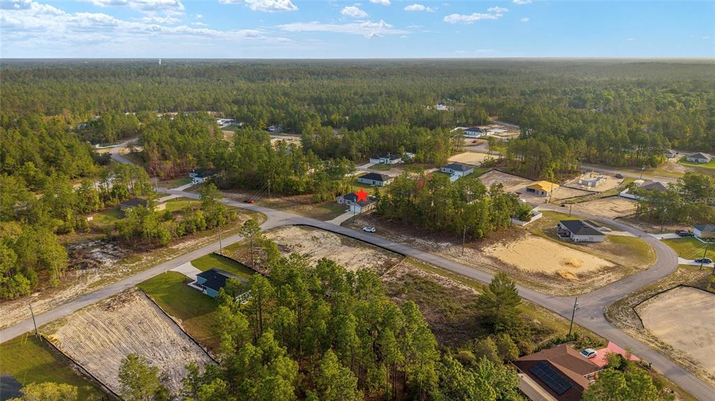 13057 Southwest 85th Circle Ocala, FL 34473 - Photo 30 of 34 an aerial view of residential houses with outdoor space