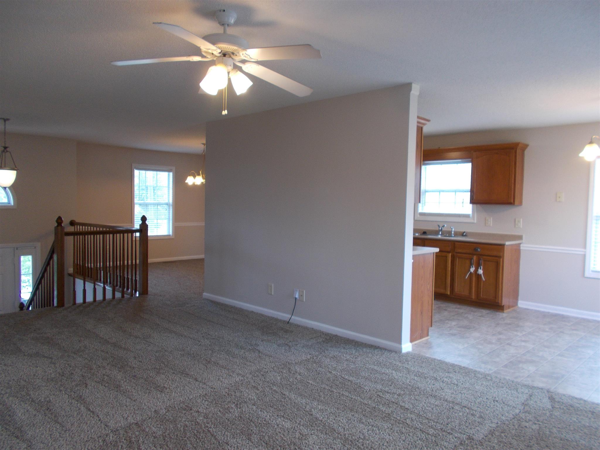 3398 Queensbury Road Clarksville, TN 37042 - Photo 5 of 26 a view of a livingroom with furniture and chandelier fan