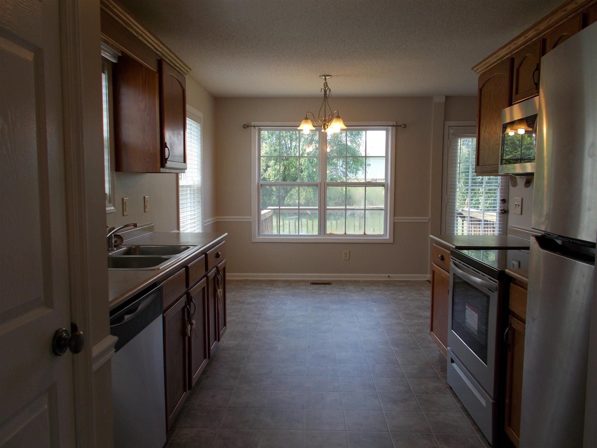 3398 Queensbury Road Clarksville, TN 37042 - Photo 8 of 26 an empty room with windows