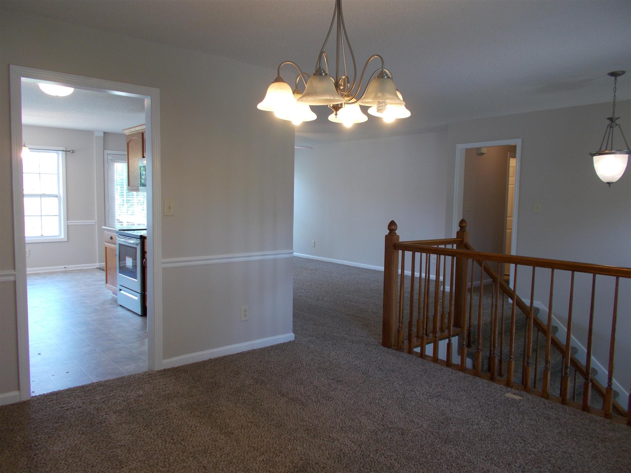 3398 Queensbury Road Clarksville, TN 37042 - Photo 9 of 26 a view of a livingroom with a chandelier