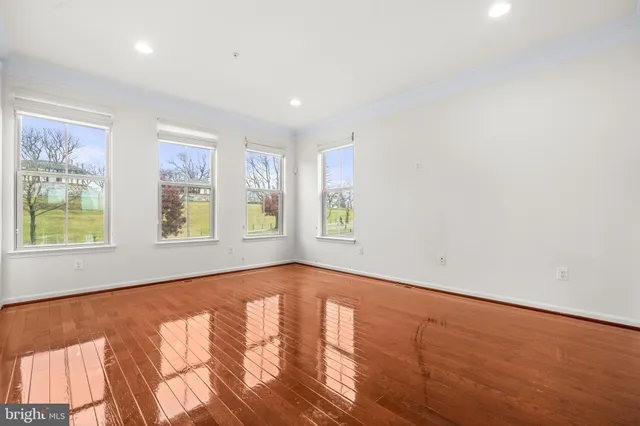 an empty room with windows