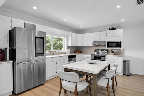 an aerial view of residential building with outdoor space