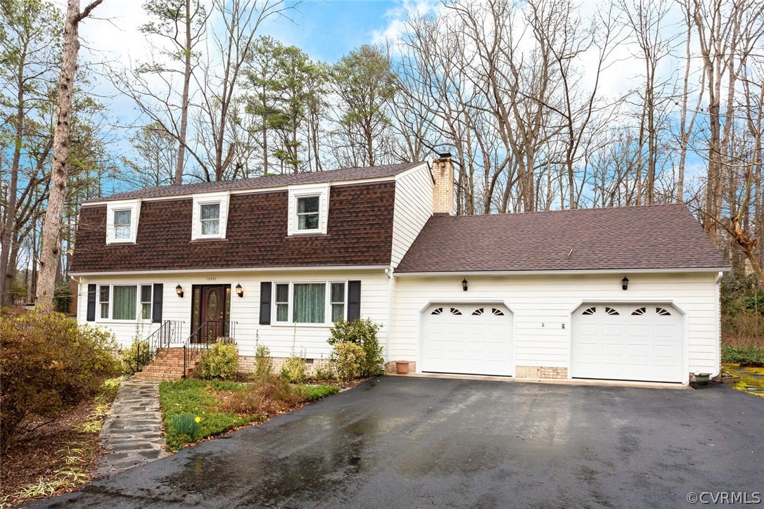 12901 Middlebrook Road Chester, VA 23831 - Photo 1 of 38 a view of a house with a yard and garage