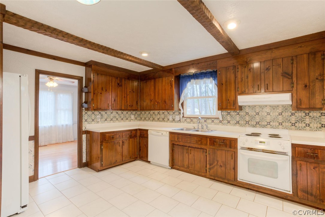 12901 Middlebrook Road Chester, VA 23831 - Photo 13 of 38 a kitchen with granite countertop a sink and cabinets