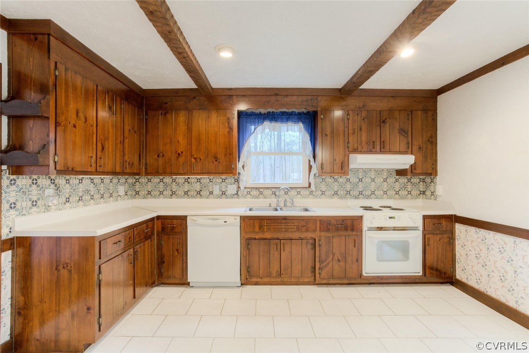 12901 Middlebrook Road Chester, VA 23831 - Photo 14 of 38 a kitchen with a sink window and cabinets
