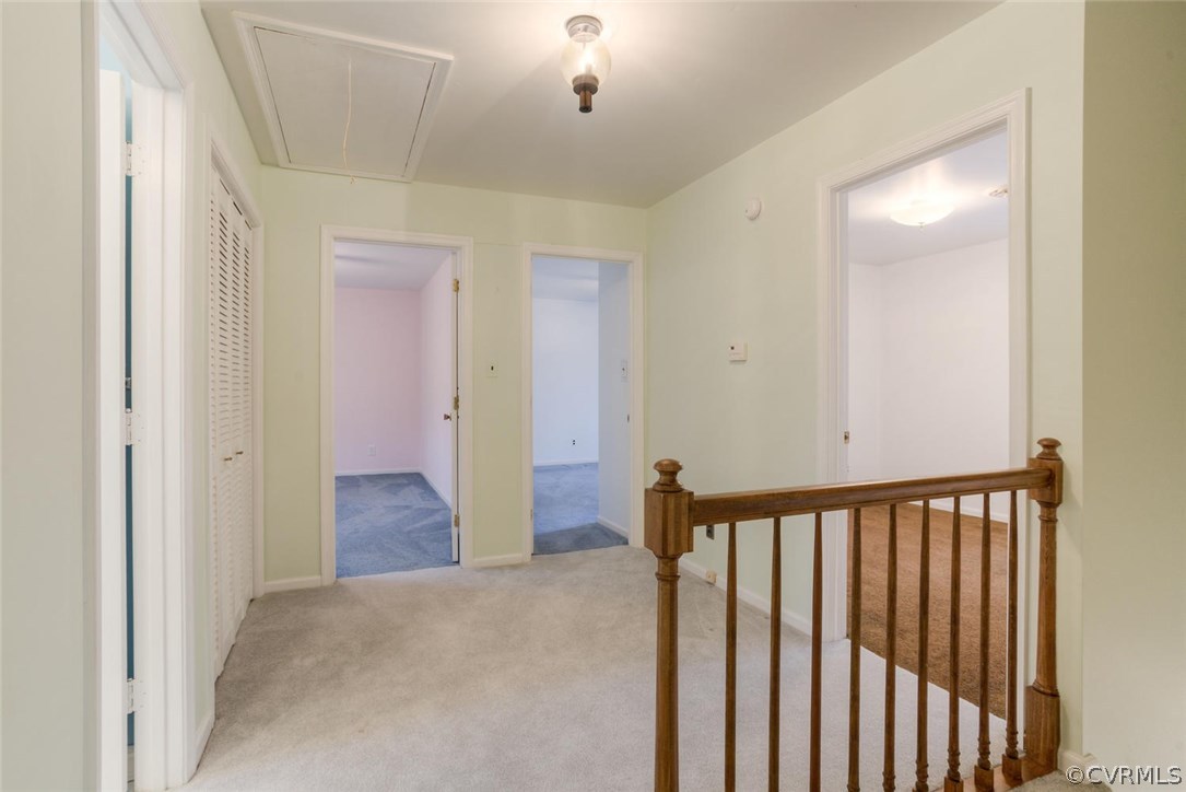 12901 Middlebrook Road Chester, VA 23831 - Photo 21 of 38 a view of a hallway and a hallway with wooden floor